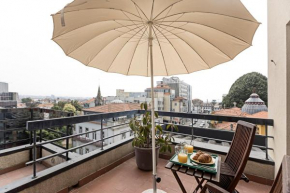 Balcony Over Porto by LovelyStay